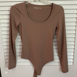 Abercrombie tan bodysuit from the Soft A&F collection. Size x small